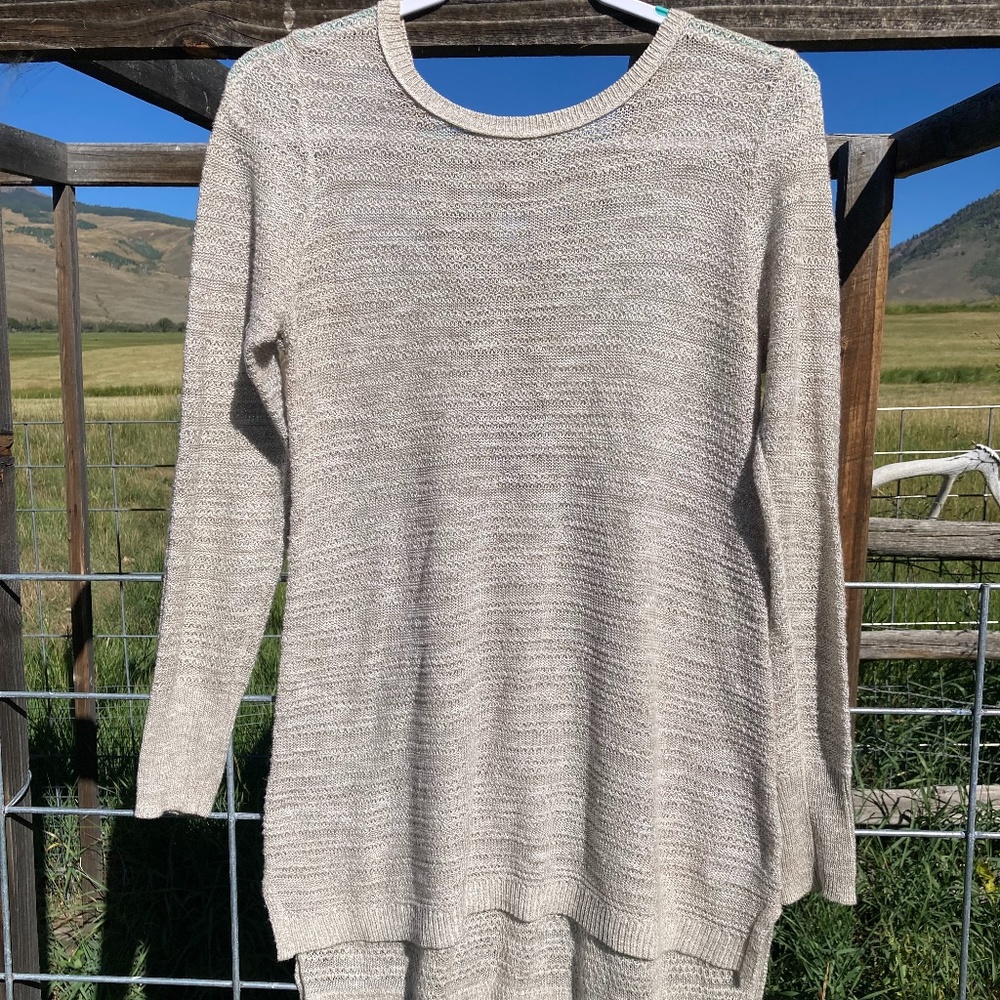 Thin knit sweater, lace up back with lace inlay.